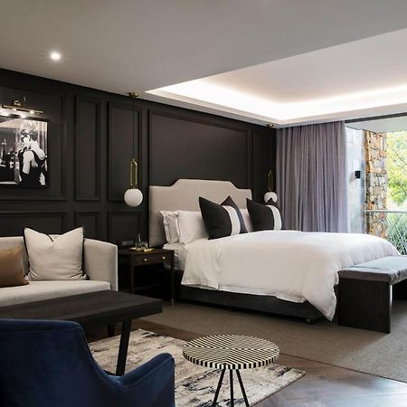 Seven Villa Hotel & Spa Йоханесбург Екстериор снимка A bedroom at the hotel